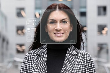 Yüz tanıma sistemi. Tarayıcı çerçeveli ve dijital biyometrik ızgaralı bir kadın açık havada