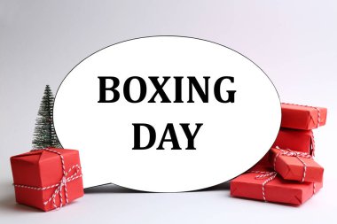 Beyaz arka planda Cümle Kutlama Günü ve Noel süslemeleri içeren konuşma balonu