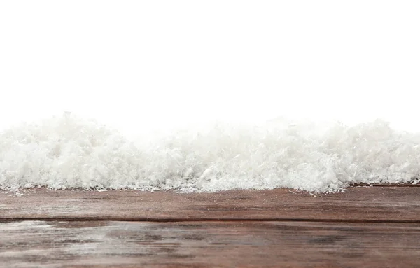 白い背景に対して木製の表面に雪 クリスマスシーズン — ストック写真