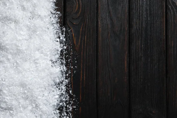 木製の背景にテキストの雪とスペース トップビュー クリスマスタイム — ストック写真