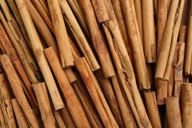 Arka plan olarak Aromatik tarçın çubukları, üst görünüm