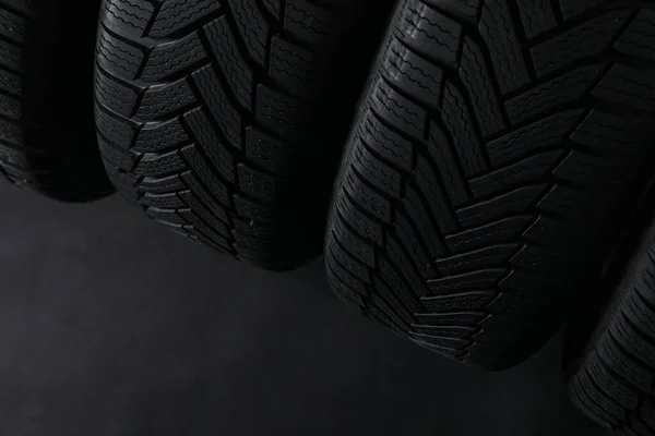 Winter Tires Dark Background Closeup Space Text — Stock Photo, Image