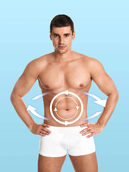 Conceito Metabolismo Homem Bonito Com Corpo Perfeito Fundo Azul Claro — Fotografia de Stock