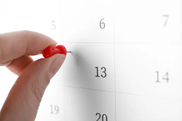 Woman Pinning Friday 13Th Calendar Closeup Bad Luck Superstition — Stock Photo, Image