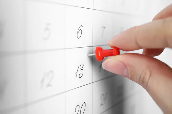 Woman Pinning Friday 13Th Calendar Closeup Bad Luck Superstition — Stock Photo, Image