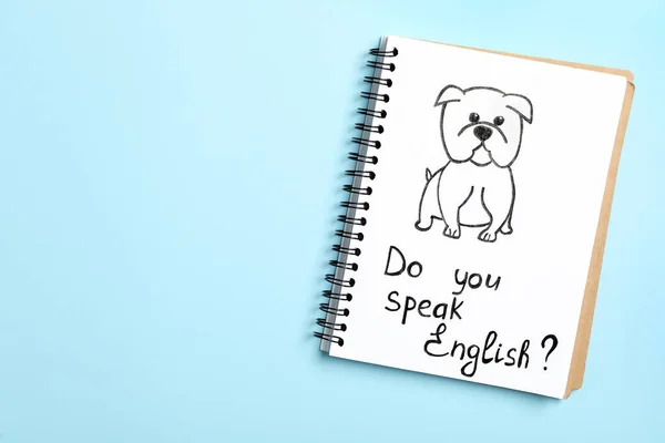 Notebook Otázkou You Speak English Light Blue Background Top View — Stock fotografie