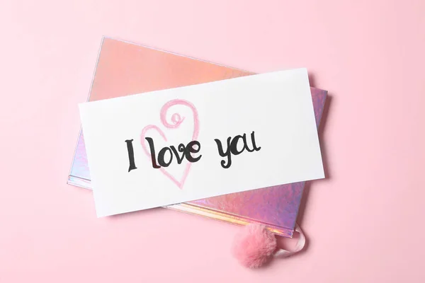 Karte Mit Text Love You Und Glänzendem Notizbuch Auf Rosa — Stockfoto