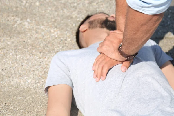Passerby Performing Cpr Unconscious Young Man Outdoors Closeup First Aid — Stock Photo, Image