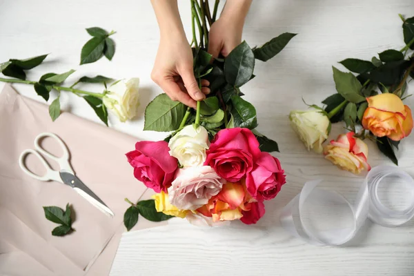 Woman Making Luxury Bouquet Fresh Roses White Wooden Table Top — Stock Photo, Image