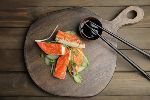 Fresh Crab Sticks Cucumber Soy Sauce Served Wooden Table Flat — Stock Photo, Image