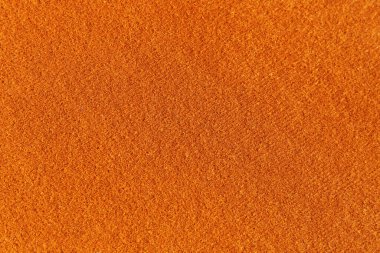 Arkaplan olarak turuncu dokulu yüzey, yakın görünüm