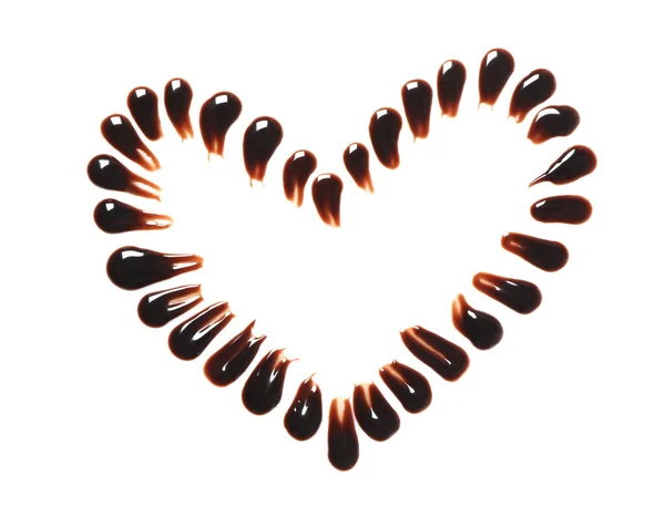 Herz Aus Dunklen Schokoladentropfen Auf Weißem Hintergrund Draufsicht — Stockfoto