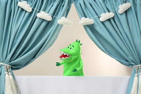 Stock image Creative puppet show on white stage indoors