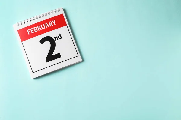 Bovenaanzicht Van Kalender Met Datum Februari Lichtblauwe Achtergrond Ruimte Voor — Stockfoto