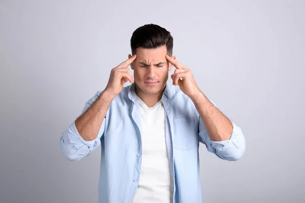 Retrato Del Hombre Estresado Sobre Fondo Claro —  Fotos de Stock