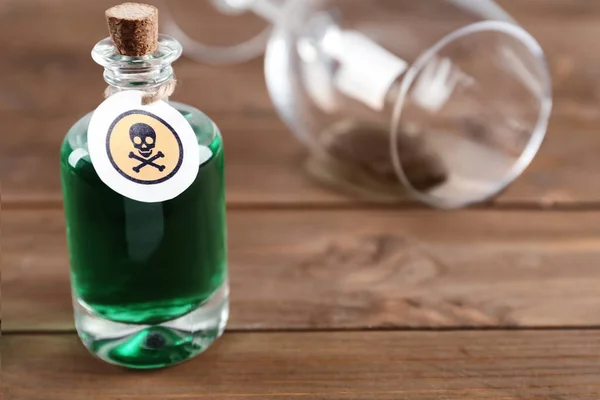 Bottle Poison Partially Emptied Glass Wooden Table — Stock Photo, Image