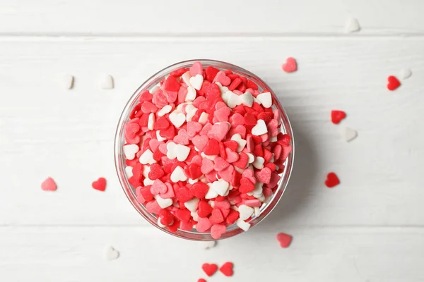 Bright Heart Shaped Sprinkles Glass Bowl White Wooden Table Flat — Stock Photo, Image