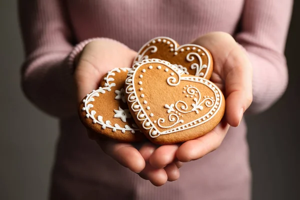 Woman Holding Tasty Heart Shaped Gingerbread Cookies Closeup — Stock Photo, Image