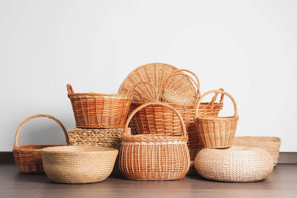 Many Different Wicker Baskets Made Natural Material Floor Light Wall — Stock Photo, Image