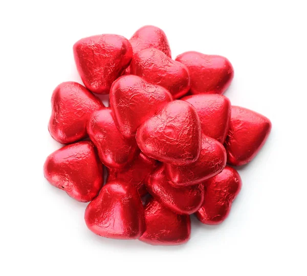 Heart Shaped Chocolate Candies Red Foil White Background Top View Royalty Free Stock Photos