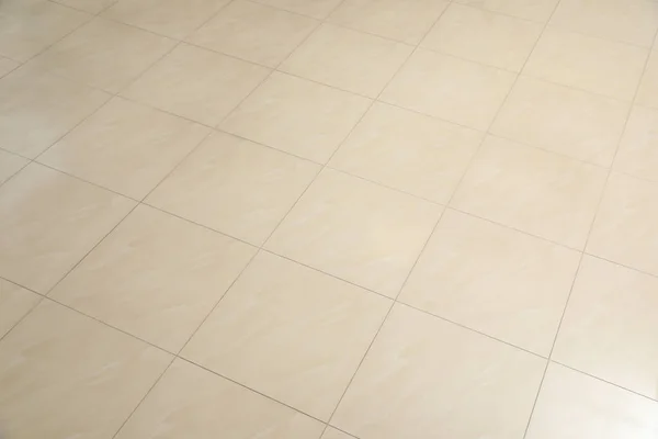 セラミックタイル張りの床を背景として 上記のビュー — ストック写真