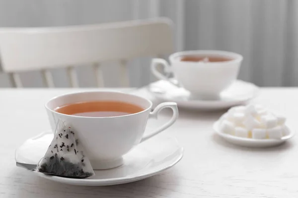 Tea Bag Cup Hot Drink White Wooden Table Space Text — Stock Photo, Image