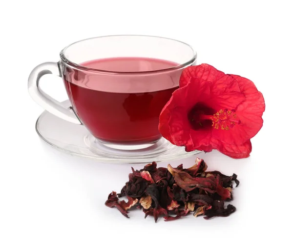 Delicious hibiscus tea and dry flowers on white background