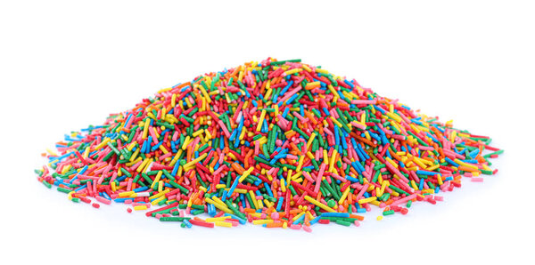 Pile of colorful sprinkles on white background. Confectionery decor