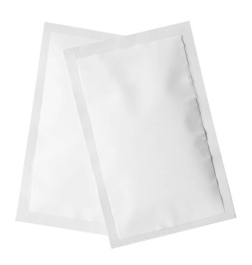 Beyazın üzerinde iki kese var. Tek kullanımlık paket