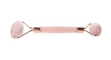 Beyaz arkaplanda gül kuvars yüz silindiri