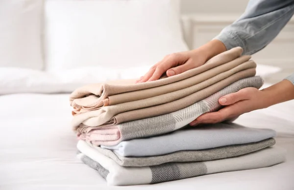 Woman Folded Cashmere Clothes Bed Closeup — Stock Photo, Image