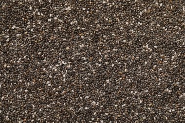 Arka plan olarak Chia tohumları, üst görünüm. Organik süper yiyecekler