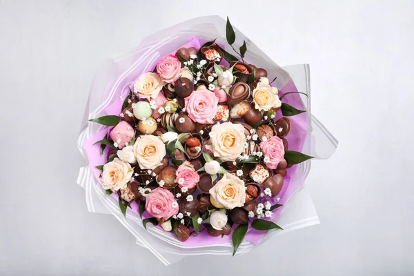 Beautiful food bouquet on light background, top view