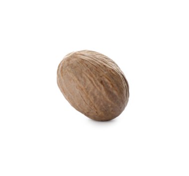 One whole nutmeg seed isolated on white