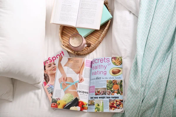 Different Lifestyle Magazines Books Coffee Bed View — Stock Photo, Image