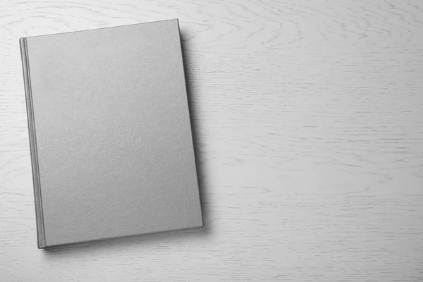 Closed Book Hard Cover Light Grey Table Top View Space — Stock Photo, Image