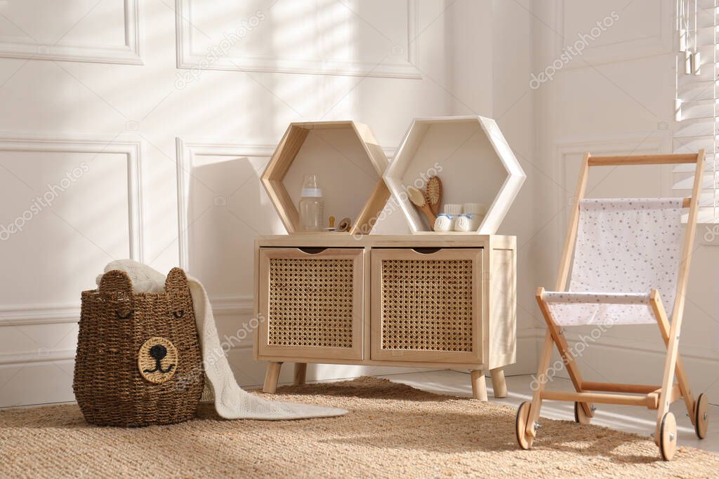 Modern child room interior with stylish furniture and accessories