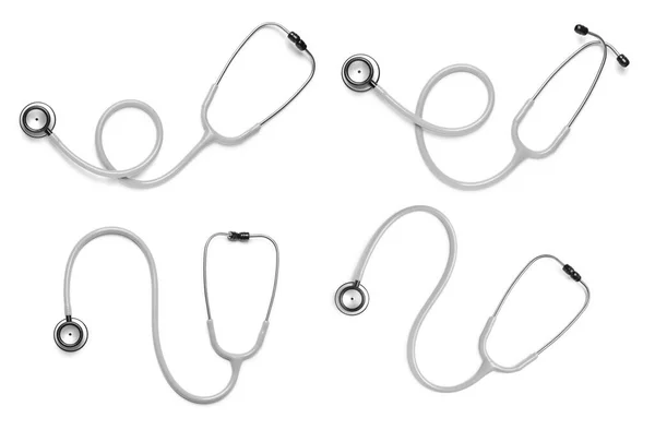 Ensemble Avec Stéthoscopes Sur Fond Blanc Vue Dessus — Photo