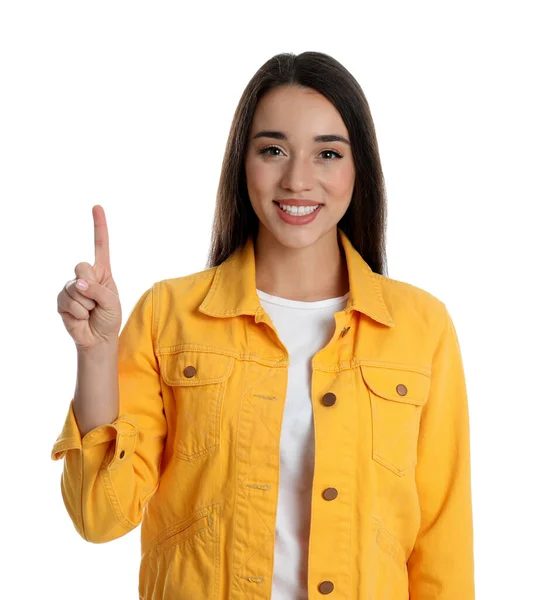 穿着黄色夹克的女人 手放在白色背景上 露出一号 — 图库照片