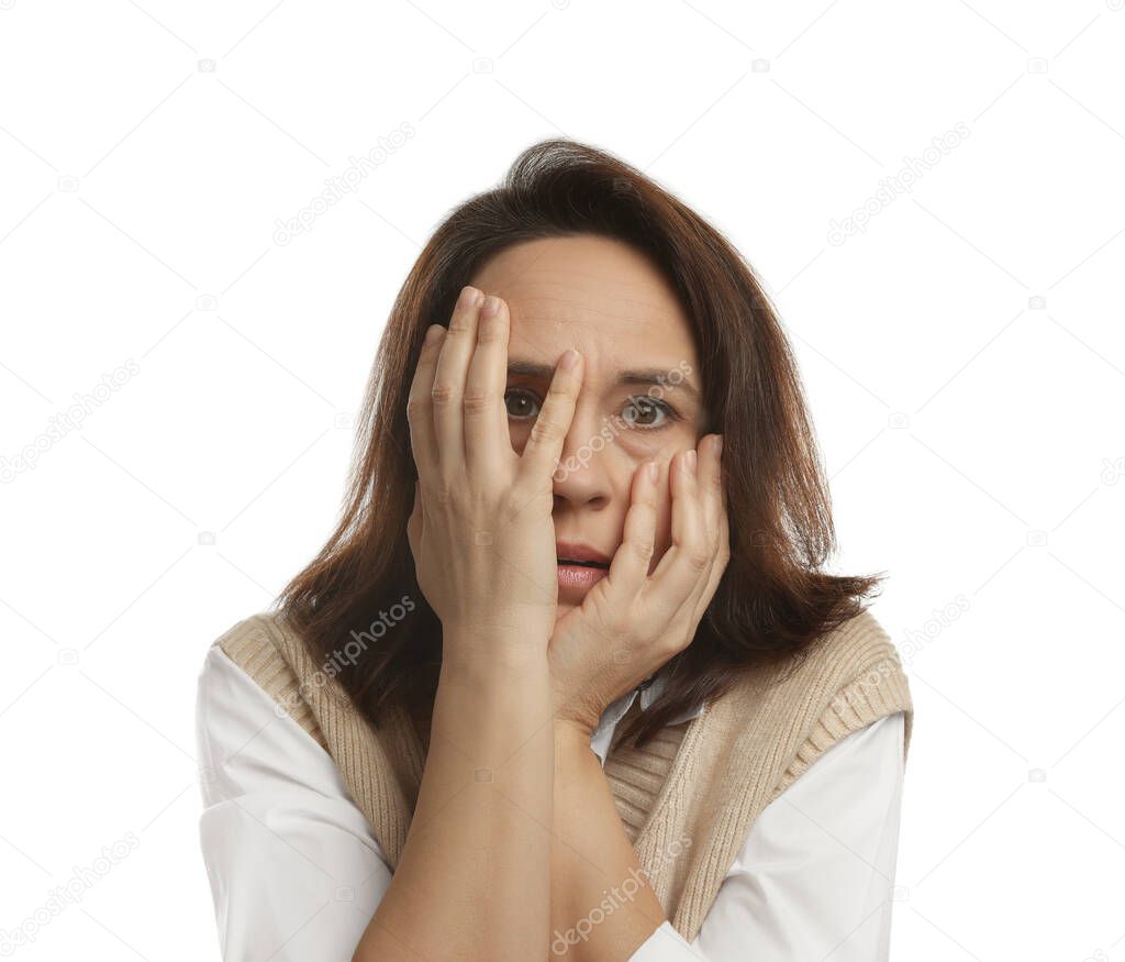 Mature woman feeling fear on white background