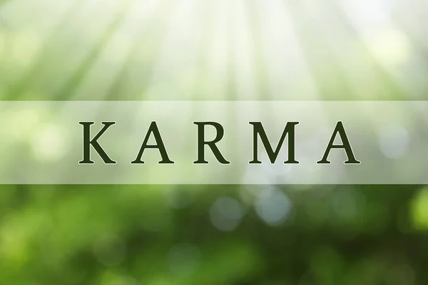 Word Karma Auf Verschwommenem Grünem Hintergrund Bokeh Effekt — Stockfoto