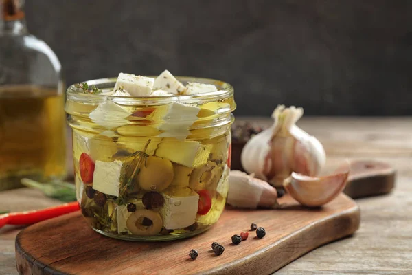 Glass Jar Marinated Feta Cheese Wooden Table — Stock Photo, Image