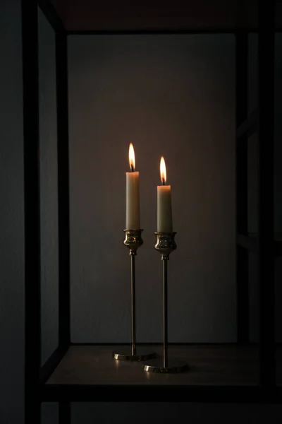 Burning Candles Shelving Unit Dark Room — Stock Photo, Image