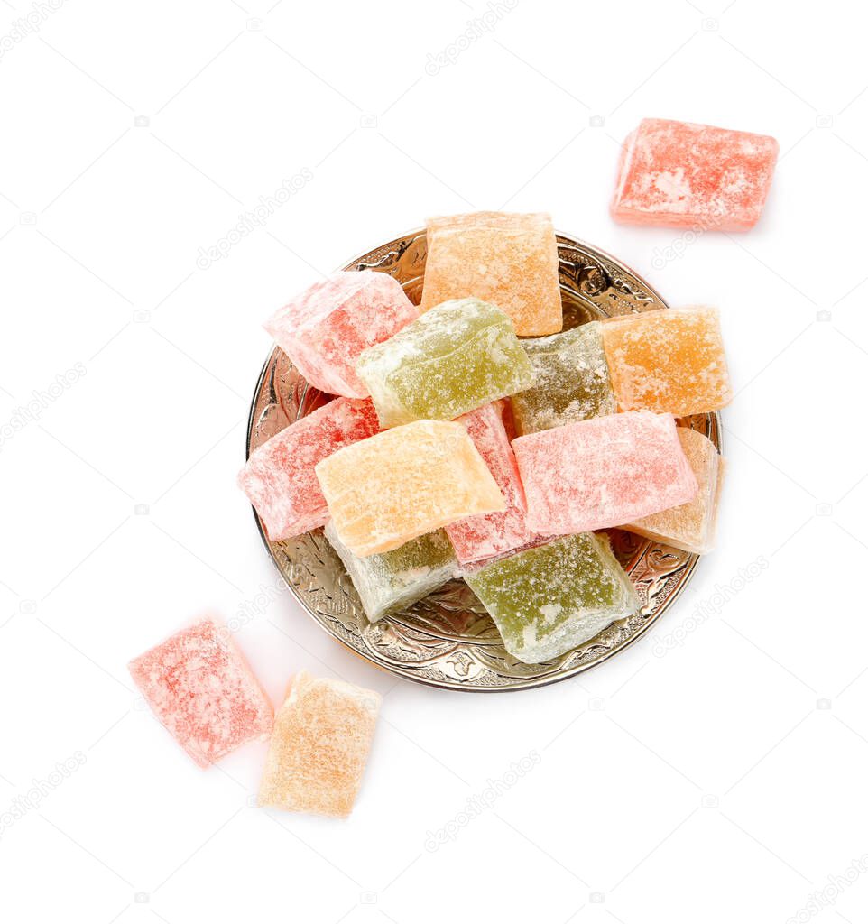 Turkish delight dessert in plate on white background, top view