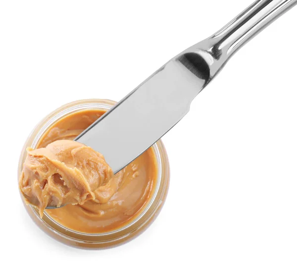 Glasschale Und Messer Mit Leckerer Erdnussbutter Auf Weißem Hintergrund Draufsicht — Stockfoto