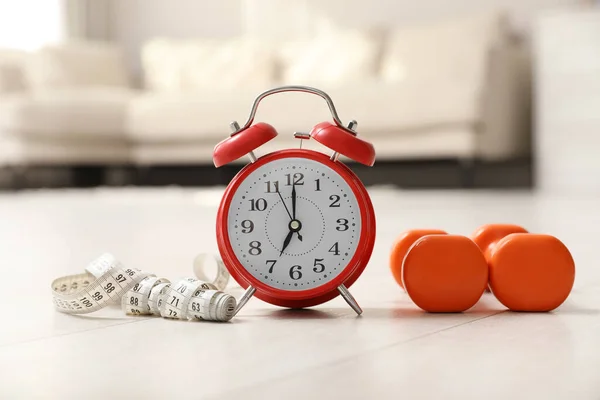 Alarm Clock Measuring Tape Dumbbells Wooden Floor Indoors Morning Exercise — Stock Photo, Image