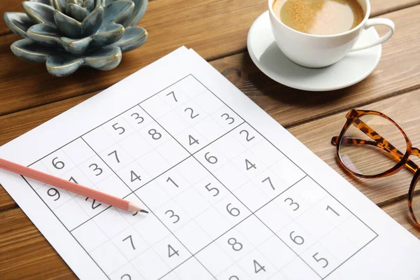 Sudoku Pencil Eyeglasses Cup Coffee Wooden Table — Stock Photo, Image
