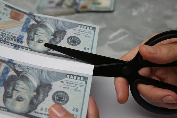 Counterfeiter Cutting Dollar Banknotes Scissors Grey Marble Table Closeup Fake — Stock Photo, Image