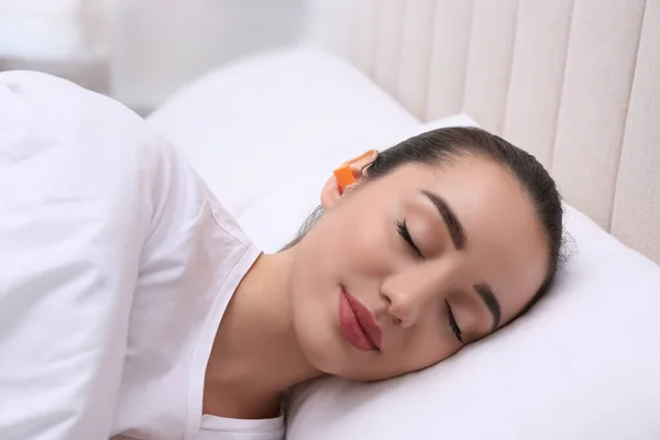 Young Woman Foam Ear Plugs Sleeping Bed — Stock Photo, Image