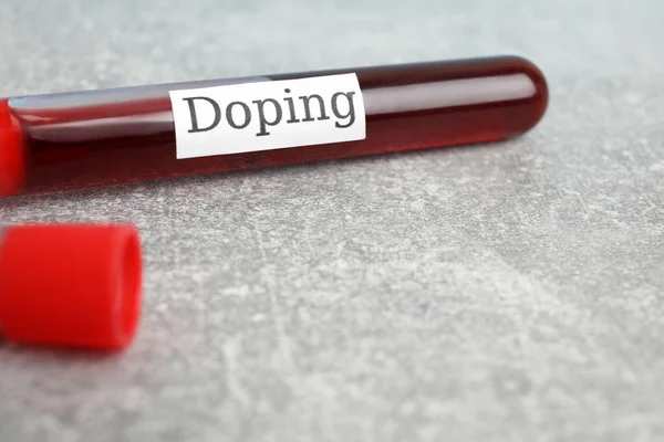 Kelime Doping Ile Tüp Kan Açık Gri Taş Masa Yakın — Stok fotoğraf